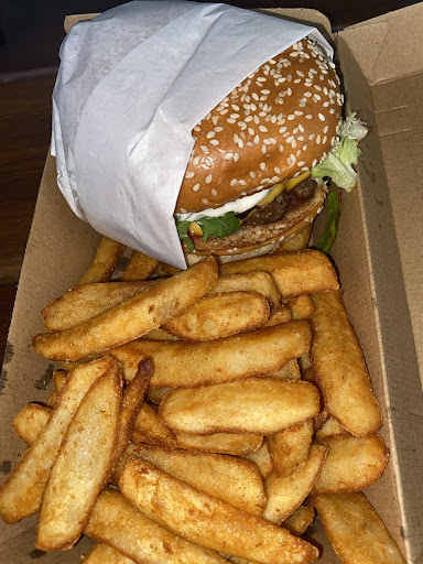 Burger and chips in a takeaway box