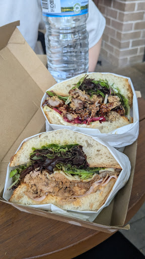 Two fresh bowls in takeaway boxes